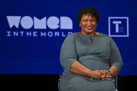 According to Stacey Abrams' financial disclosure report in 2018, she owed $228,000 in debt.